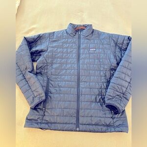 Blue Patagonia nano puff jacket